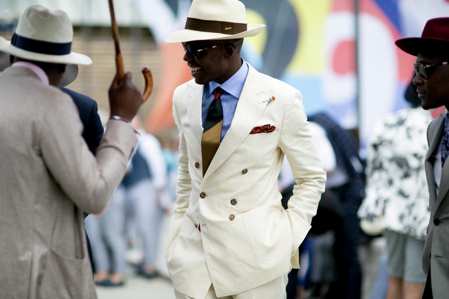 Panama Man in ivory suits wears a classic panama