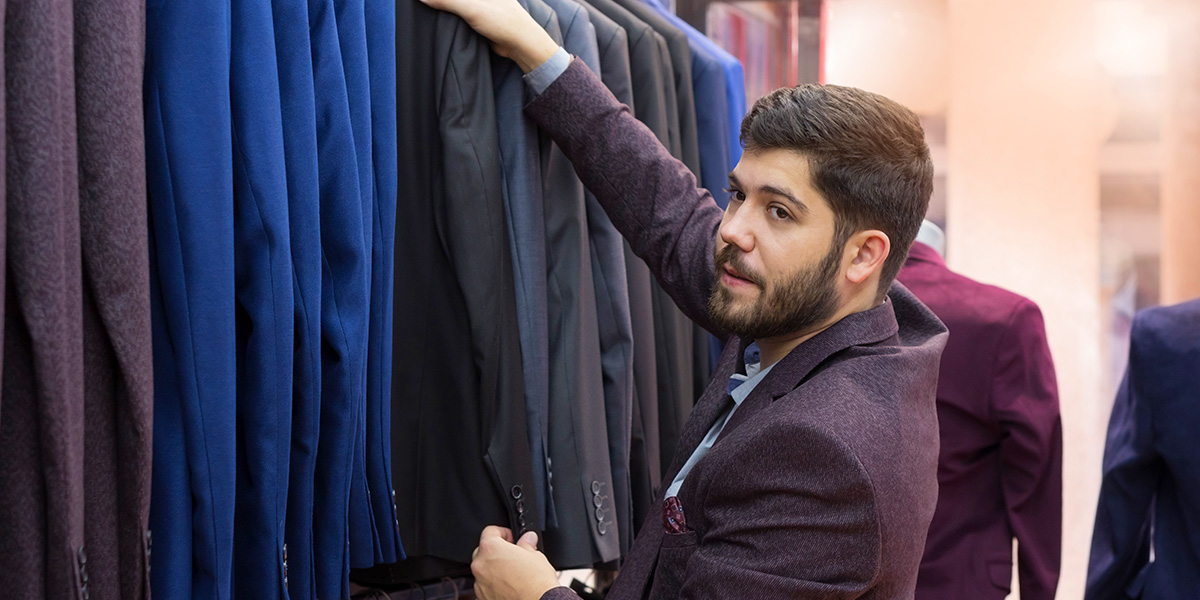 A man looking for ready to wear clothes